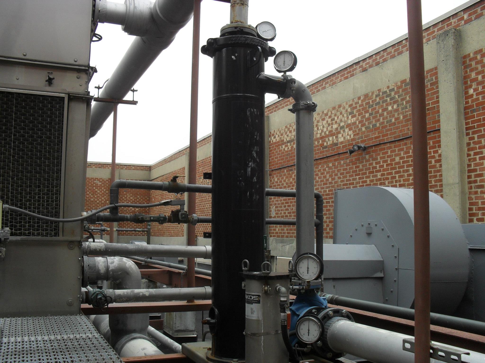 Feed lines to the cooling towers. Inside of the former Brick Curtain Wall