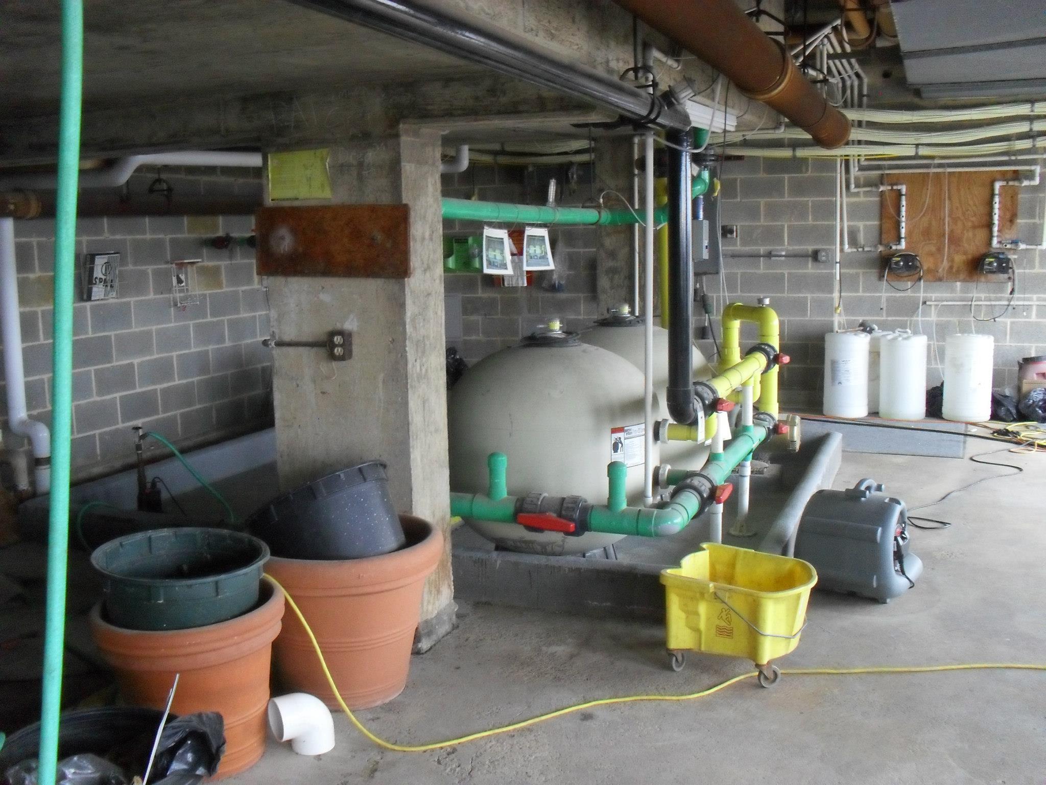 Beneath the pool deck is the pool storage room